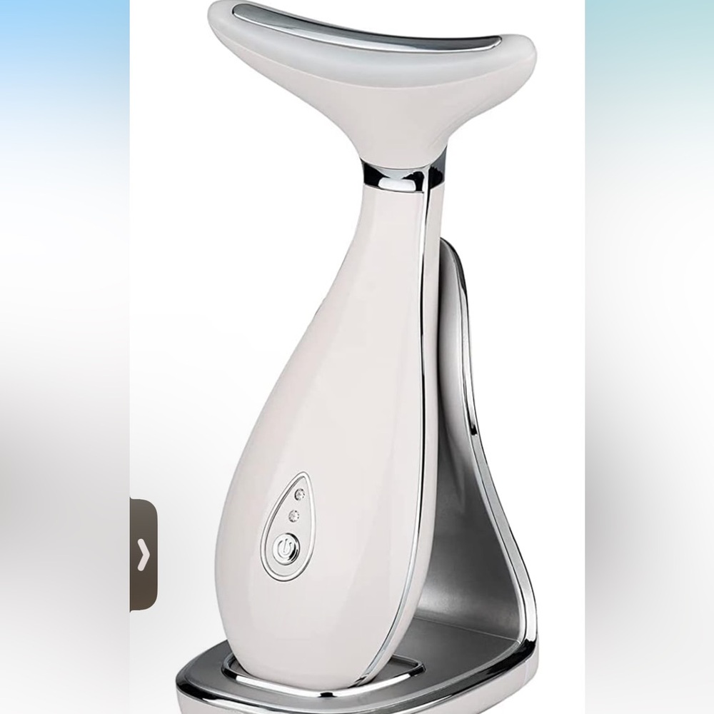 Sleek White and Silver Facial Device